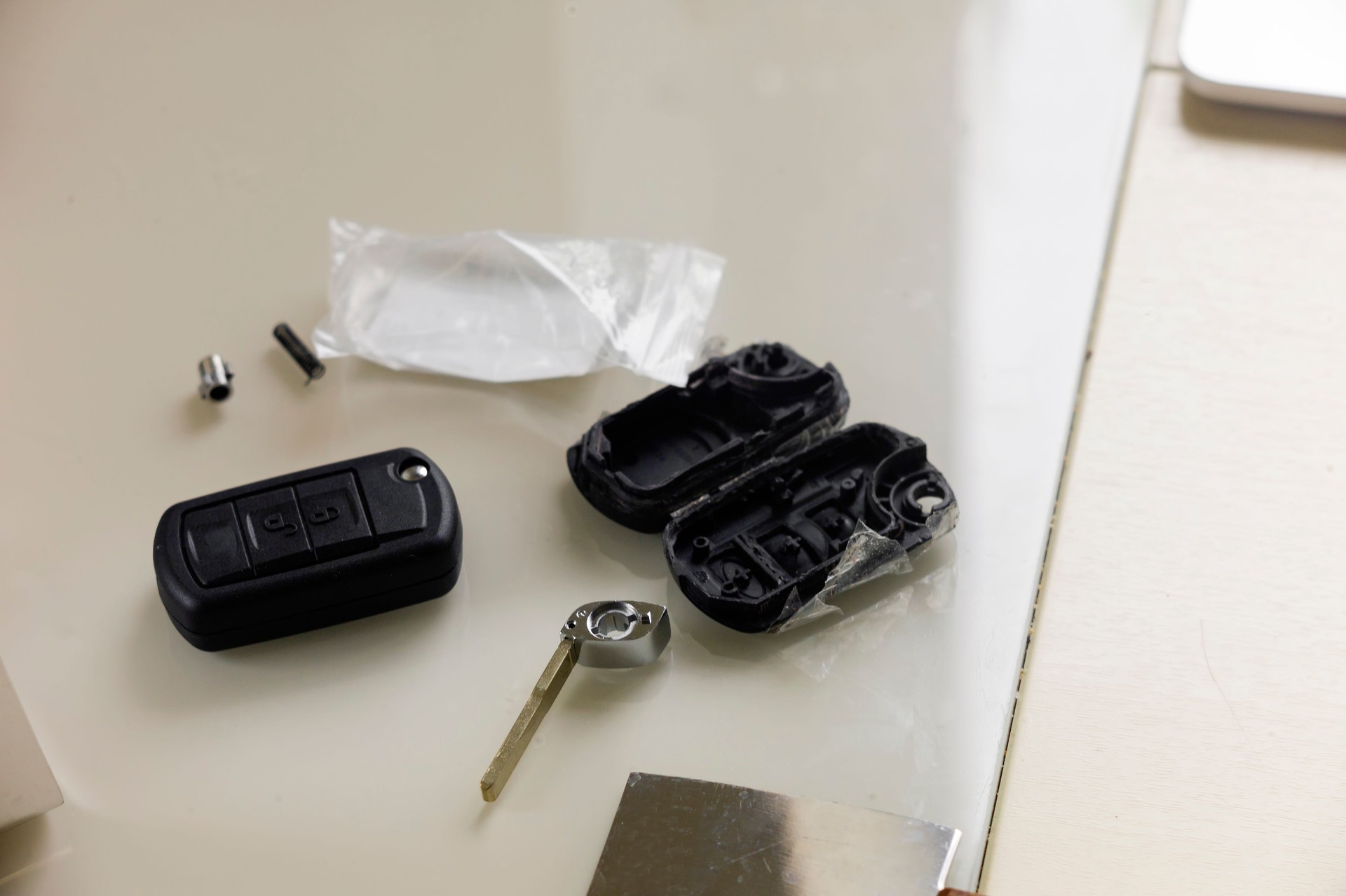 Old disassembled and new ignition keys